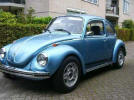 Een blauwe Volkswagen kever 1303 Big Bug op Superbeetles.nl